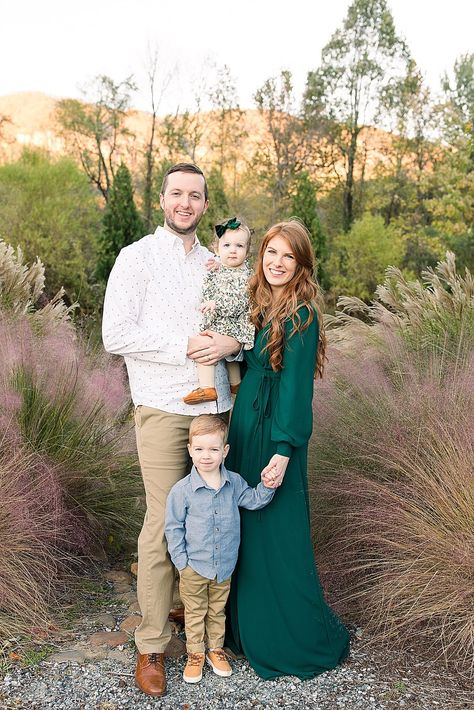 Check out this Lake Lure Family Photo Session in the North Carolina Mountains. This stylish family has the best-coordinated outfits for fall photos! We love this gorgeous emerald green dress for outfit inspiration! #familyphotos #mountains #outfitideas #family #photographer #fall Family Photos Forest Green, Forest Green Outfits For Family Pictures, Fall Family Photos Hunter Green, Velvet Green Dress Family Pictures, Fall Family Pictures Outfits Green And Cream, Family Photos Emerald Green Dress, Family Pictures With Green Dress, Family Photos Green Outfits, Hunter Green Family Picture Outfits Fall