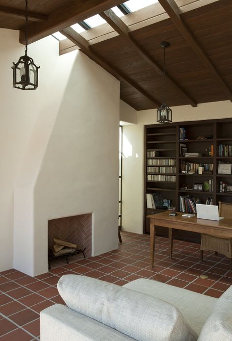 Custom skylights allow natural light to pour into the home office giving the room the feel of an outdoor space. Modern Adobe House, Modern Adobe, Adobe Home, Historic Renovation, Adobe House, Pergola With Roof, Courtyard House, Modern Home Office, California Homes