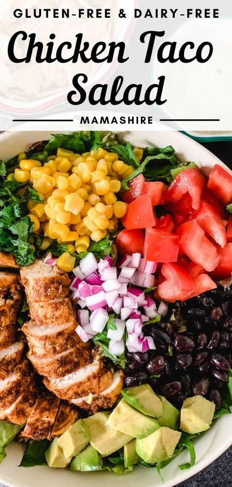 A closeup of a chicken taco salad that has seasoned chicken strips, corn, chopped tomatoes, chopped red onions, black beans, and avocado. How To Make A Salad Look Pretty, Chicken Taco Salad Meal Prep, Chicken Fajita Taco Salad, Chicken Taco Salad Recipe Healthy, Taco Salad Chicken Recipe, Taco Chicken Salad Recipe, Fun Salads Healthy, Healthy Chicken Taco Salad, Healthy Chicken Taco Bowl