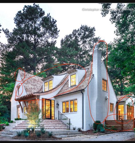 Stone cottages 

￼
Nice materials and landscaping. Probably the old tree and dog I like most 😊 Stone, timbers, COPPER elements, big bay window.  Roof of stone, cedar shake or metal roof instead though? Needs more side wings like large outdoor living area added to front left or an angled detached garage joined by enclosed porch. Has two chimneys but neither are featured in front. Swoop roofed line added?
￼
Narrow arch windows but the front is too flat. Cute dormer and has a swoop. Needs more of a front door nook, big bay window, screened in porch and a featured chimney as well as more surface textures.  
￼
Love the swoop, textured exterior and featured stone fireplace. Expand master suite. Add more outsets and front door nook.  Not sure about the roof but it evokes a thatched roof feel. Li Front Door Nook, Bay Window Roof, Arch Windows, Victorian Homes Exterior, Window Roof, Enclosed Porch, Cedar Shake, Cedar Shakes, Homes Exterior