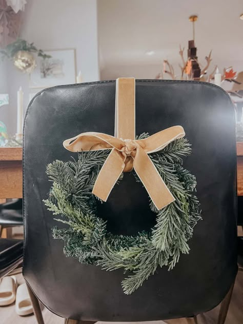 DIY Mini Chair Wreaths for Christmas – Love & Renovations How To Decorate Dining Room Chairs For Christmas, Christmas Bar Stools Decor, Christmas Chair Back Decorations, Wreaths For Chair Backs, Christmas Rocking Chair Decor, Bows On Chairs Christmas, Wreaths On Bar Stools, Christmas Wreath On Bar Stool, Wreaths On Chairs Christmas Decor