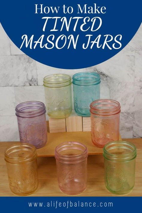 I just love using colored glass jars in to decorate my home. They can be used in so many different ways. Fill them with flowers, candy, pasta or seashells to add a splash of color to any spot in your home. Here is how to make tinted mason jars using food coloring and mod podge. I’ll teach you how to apply mod podge without streaks and how to make the jars so that they can have water in them without diluting the color. This is an easy craft that you can decorate with year-round. Diy Tinted Mason Jars, How To Color Tint Mason Jars, How To Tint Mason Jars, How To Color Mason Jars, Color Mason Jars Diy, How To Make Colored Glass Jars, Tinting Glass Jars Diy, Painting Jars Diy, Color Glass Diy