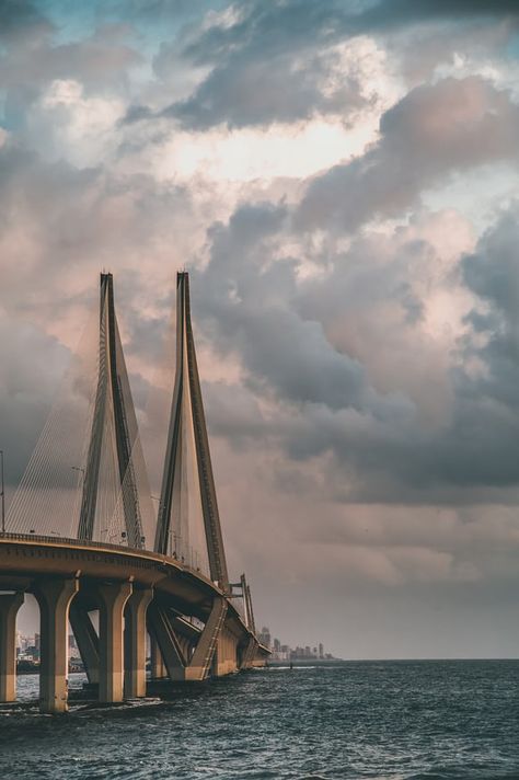 brown concrete building under blue sky during daytime photo – Free Architecture Image on Unsplash Marine Drive Mumbai, Bandra Worli Sea Link, Mumbai Travel, Travel Destinations In India, Mumbai City, Beautiful Travel Destinations, Mumbai India, City Wallpaper, Dream City