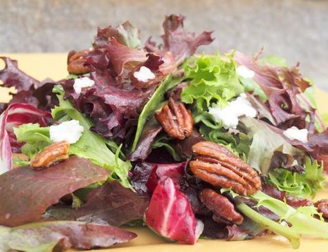 If you’ve had dinner at my house, chances are you’ve had this salad. It's perfect for entertaining -- the glazed pecans and goat cheese dress it up, and the vinaigrette is one of those salty-sweet-tangy flavor combinations Mesclun Salad, Salad With Goat Cheese, Once Upon A Chef, Glazed Pecans, Dijon Vinaigrette, Resep Salad, Salad Mixed Greens, Vinaigrette Recipe, Autumn Salad