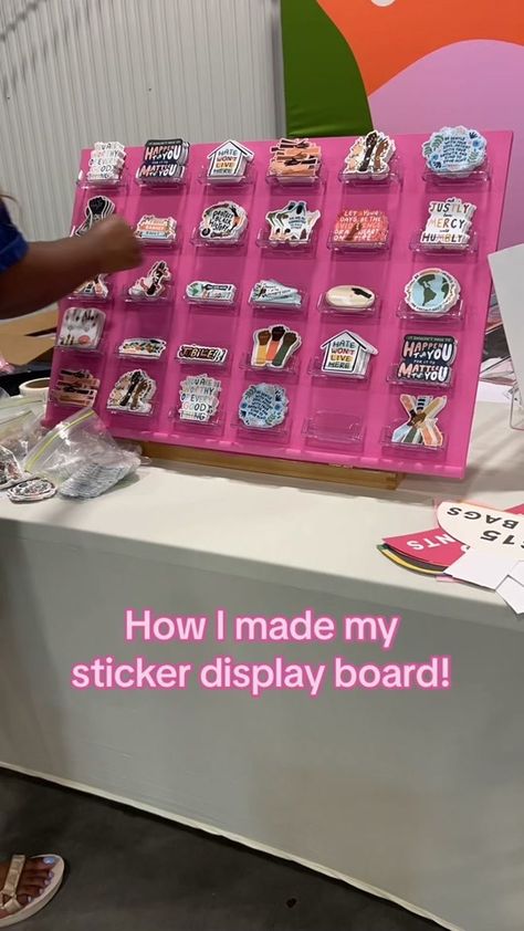 My DIY sticker display board courtesy of @Smile Cult’s tutorial 🫶🏾 r... | Diy Stickers | TikTok Best Vendor Booth Ideas, Display Stickers For Sale, Craft Booth Sticker Display, Sticker Vendor Booth Display Ideas, How To Display Car Decals At Craft Show, Sticker Display Ideas Retail Diy, Ways To Display Stickers For Sale, Peg Board Sticker Display, Craft Fair Sticker Display Ideas