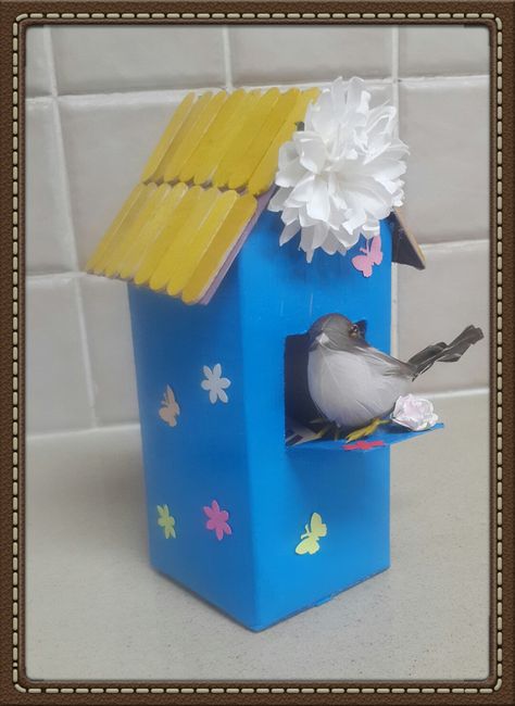 Milk carton birdhouse, made with my youngest daughter for school recycling project Recycle Bird House, Bird House Diy Recycled, Bird Feeders Milk Carton, Bird House Milk Carton, Milk Carton Bird Feeder, Bird Feeders For Kids To Make Recycling, Birds Craft, Plastic Bottle Crafts Diy, Youngest Daughter