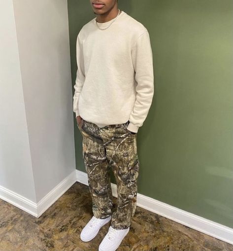 Mens Clean Fashion Aesthetic, Causal Fits Men, Hunting Pants Outfit Men, Camo Pants Outfit Men’s, Fits With Camo Pants, Men’s Cream Cargos Outfit, Mens 2024 Fall Fashion, Camo Pants Men Outfit, Baggy Camo Pants Outfit Men