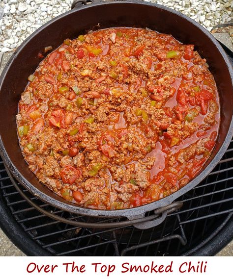 There are as many variations of Over The Top smoked chili as there are variations of ‘regular’ chili. Often referred to as OTT chili, the basic idea is that you smoke a ground beef mixture over a pot of chili mixings, such as tomatoes, beans (oh no! I used beans!), etc. As the beef cooks some of the fat drips into the chili pot, adding flavor. And of course the smoked beef picks up on some smoke flavor, too. Over The Top Chili Smoker, Ott Chilli, Over The Top Chili Pit Boss, Over The Top Smoked Chilli, Over The Top Chili Traeger, Smoked Over The Top Chili, Over The Top Chili Pellet Grill, Over The Top Smoked Chili, Smoked Chilli Recipe