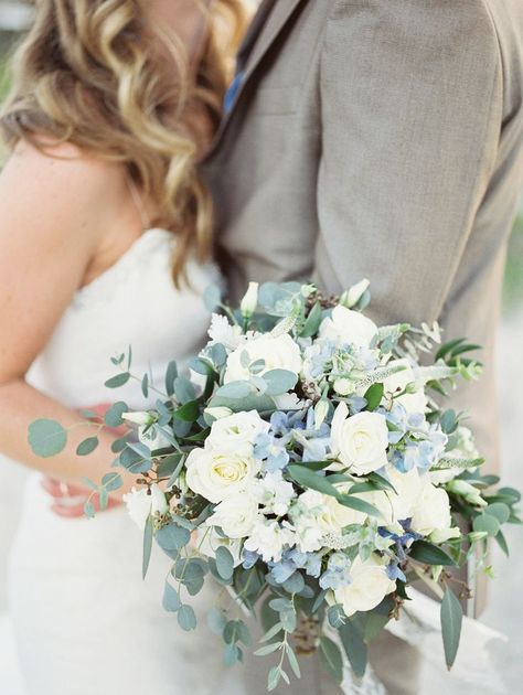 At this coastal wedding, David's Flowers created a spray out of ocean-blue forget-me-nots, white roses, and eucalyptus. Beach Bouquet, 1920's Wedding, Wedding Flower Guide, Wedding Boards, Blue Wedding Bouquet, Beach Wedding Flowers, Blue Wedding Flowers, Beach Wedding Inspiration, Shoes Low