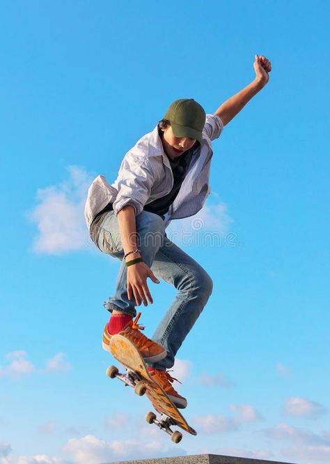 Skateboarder hand up. Skateboarder jumps in town park on background sky with clo , #spon, #jumps, #town, #Skateboarder, #hand, #sky #ad Croquis, Skater Poses, Jumping Poses, Sports Photography Tips, Skateboard Photography, Drawing Body Poses, People Poses, Human Reference, Body Reference Poses