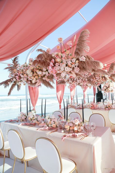 Inspired by Beyoncé’s “Love On Top,” Phuong and Tung celebrated their union with a modern beach wedding in Vietnam. The day was filled with on-trend decor and floral in the form of pampas grass, a custom neon pink sign, and a coral color palette. The most swoon-worthy design detail? The unique ceremony arch that the … read on Coral Colour Palette, Venue Decorations, Beach Wedding Decorations, Ceremony Arch, Wedding Goals, Wedding Cake Designs, Wedding Deco, Wedding Planners, Wedding Themes