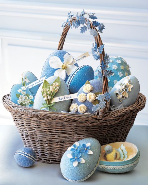 21 of Our Best Easter Basket Ideas | Spring's pretty blue skies inspire this basket, tucked with shimmering German egg boxes. They make for an extra special family tradition—each year, every person can find a gift inside an egg.  #easter #easterbaskets #uniqueeasterbaskets #marthastewart Garden Easter Basket, Pink Easter Basket, Unique Easter Baskets, Fun Easter Baskets, Baby Easter Basket, Holiday Baskets, Easter Baskets For Toddlers, Easter Basket Ideas, Easter Bunny Basket