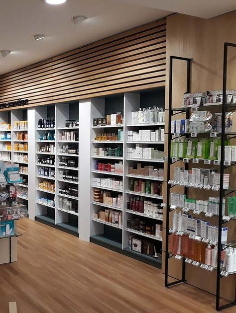 Slatwall Ideas Retail, Store Display Design, Mobile Shop Design, Furniture Store Design, Pharmacy Decor, Healthcare Interior Design, Shoe Store Design, Pharmacy Store, Architecture Bathroom