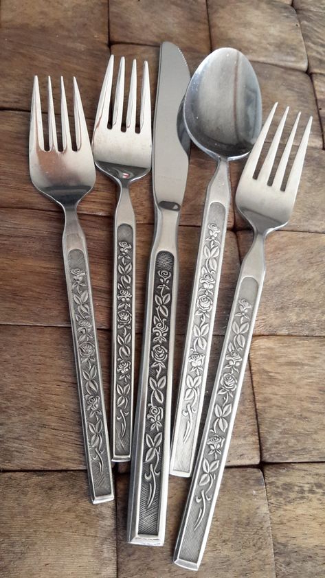 "VINTAGE BLACK ACCENTED FLORAL PATTERN FLATWARE Pretty vintage Maria Grande stainless steel flatware. Embossed floral and black accent pattern. Squared end knives, forks, spoon. Choice of individual silverware pieces. Made in Japan by an unknown manufacturer. All the Maria Grande stainless pieces are in very nice pre-owned vintage condition. CHOICE of Maria Grande Pieces & APPROXIMATE SIZES Small fork 6 1/4' Teaspoon 6 1/4\" Dinner fork, 7 3/8\" Dinner knife 8 1/2\" Place/soup spoon 7 1/2\" Table/Serving Spoon 8 1/2\"" Cute Things For Apartments, Unique Silverware Sets, Cute Silverware Set, Aesthetic Silverware, Silverware Aesthetic, Wedding Silverware Ideas, Fun Silverware, Cottagecore Utensils, Utensils Aesthetic