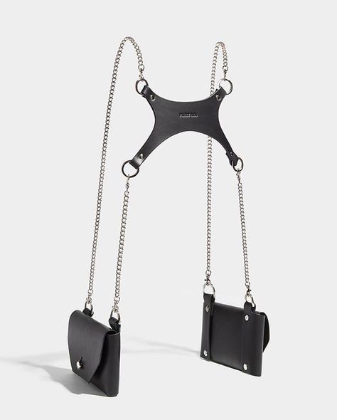 The Double Pocket Chain Harness is made from smooth saddlery leather and is worn as in a harness style. Slim silver chain straps elegantly… How To Style A Harness, Leather Bags With Chain Strap, Leather Straps Harness, Leather Bag With Chain Strap For Fashion, Harness With Pockets, Punk Strapped Fitted Harness, Harness Style, Fleet Ilya, Chain Harness