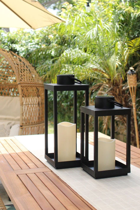 Enhance your outdoor ambiance with our stunning Outdoor Candle Lantern. Made from premium materials, this large decorative lantern is both durable and visually captivating. Whether you're hosting a cozy gathering or enjoying a peaceful evening alone, the soft flickering glow of the candle inside this lantern creates an enchanting atmosphere. Lantern Decor Outdoor, Large Lantern Decor, Modern Outdoor Decor, Outdoor Candle Lanterns, Tent Ideas, Outdoor Ambiance, Patio Lanterns, Outdoor Candle, Floor Lantern