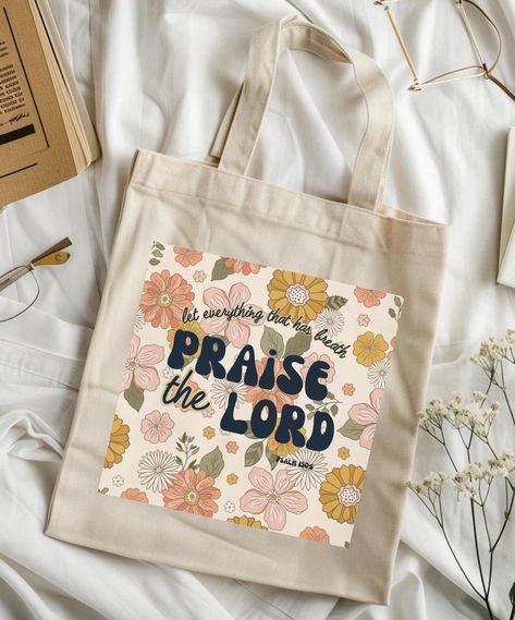 let everything that has breath praise the Lord retro tote bag This 100% cotton bag comes in one size - 15" x 16"- perfect for everyday wear.  .: 100% cotton canvas .: Heavy fabric (12 oz/yd² (406.9 g/m .: Sewn-in label Bible Verse Tote Bag Painting, Tote Bag Painting Ideas Christian, Bible Bags Totes Diy, Christian Tote Bag Design, Cricut Bags, Christian Gifts Diy, Bible Study Crafts, Bible Tote Bag, Tote Bag Christian