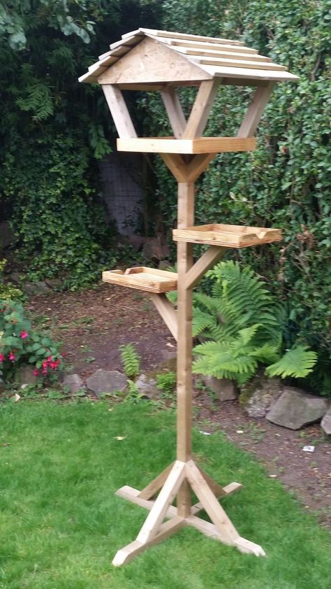 Another neat bird feeder mount -- platform feeders on the sides