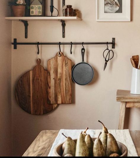 Wall Rack Kitchen, Hanging Cups In Kitchen, Kitchen Simple Decor, Hanging Pans Kitchen, Hanging Pans In Kitchen, Kitchen Hooks Ideas, Hanging Pots And Pans On Wall, Hanging Utensils In Kitchen, Kitchen Wall Hanging Ideas