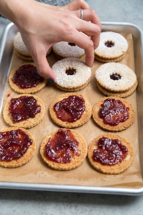 Linzer Cookies - The Little Epicurean Hazelnut Linzer Cookies, Raspberry Jam Cookies, Linzer Torte Cookies, Hazelnut Shortbread, Austrian Desserts, Linzer Cookie, Homemade Raspberry Jam, Easy Christmas Cookie Recipes, Cookie Sandwiches