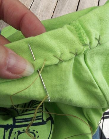 How to Alter a T-Shirt How To Alter The Neckline Of A Tshirt, Altering T Shirts Neckline, Tee Shirt Neckline Alterations, How To Hem A Tee Shirt, T Shirt Neckline Alteration Diy, Shorten Tshirt Sleeve, How To Alter A T Shirt Neckline, Altering T Shirts, How To Hem A T Shirt