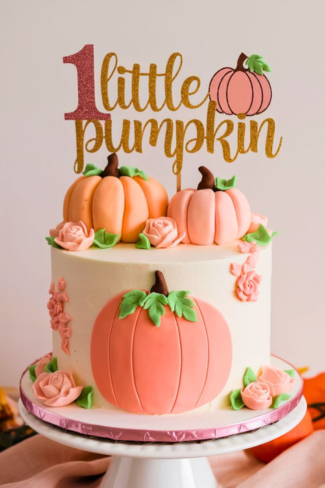 This image features a charming "Little Pumpkin First Birthday Cake" with pink and peach pumpkins, perfect for a fall-themed celebration. The gold glitter "1 Little Pumpkin" topper adds a cute touch, ideal for an "Our Pumpkin is Turning One" party. This cake is perfect for a "Pumpkin Theme Smash Cake" and fits beautifully with first birthday fall ideas. November First Birthday Theme Girl, Pumpkin Baby Shower Cake Girl, One Little Pumpkin Birthday Girl, September 1st Birthday Girl, October 1st Birthday Girl, Pumpkin 1st Birthday Cake, Fall First Birthday Girl, Pumpkin First Birthday Cake, Pumpkin First Birthday Girl