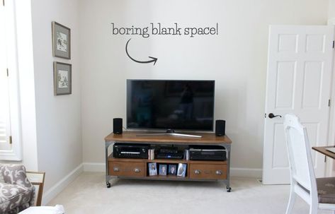 Wondering how to decorate that bare wall above your TV. This post gives you the quick and simple solution that you're looking for! Decor Above Tv, Shelf Above Tv, Decorate Tv Wall, Decor Around Tv, Driven By Decor, Tv Stand Decor, Tv Wall Decor, Entertaining Decor, Tv Decor