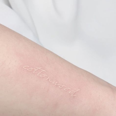 White Ink Word Tattoo, White Word Tattoos, White Script Tattoo, White Ink Hand Tattoo, Tiny White Ink Tattoo, White Tattoo Healed, White Ink Tattoo Ideas, White Tattoos For Women, White Ink Tattoos Healed