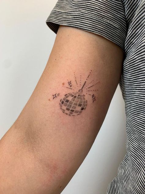 Mirrorball Tattoo Placement, Glitter Ball Tattoo, Mirrorball Tattoo Minimalist, Bloom Tattoo Words, Tiny Disco Ball Tattoo, Disco Ball Tattoo Simple, Harry Styles Disco Ball, Simple Clock Tattoo, Daylight Tattoo