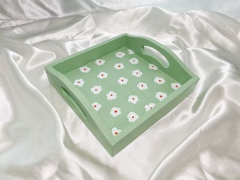 "See more items from my Danish Pastel Collection: https://etsy.me/3lAE93O See all my items: https://www.etsy.com/shop/sugarpillstudios/ Handcrafted wooden tray. Painted by hand with acrylic & tempura paints. Then it is air-dried and glazed with an acrylic finish to lock in color and seal. Each piece is one of a kind. No piece is perfect and there may be small imperfections. Approximate size: 6\"L x6\" W x 1.75\"H *PLEASE NOTE* Every piece is made to order by hand. Products may differ slightly i Danish Pastel Decor, Bathroom Vanity Tray, Pastel Home Decor, Tray Coffee Table, Catchall Tray, Painted Trays, Paint Tray, Green Pastel, Tanah Liat