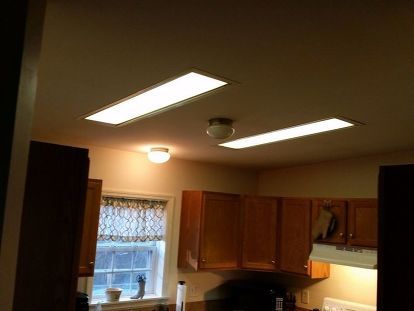 I have 2 fluorescent lights in my small kitchen and I want to update or replace them. I like the amount of light I get from them but I think they are ugly. I'm thinking track lighting is the best option (see example pic). The ceiling slopes so I'm not sure a flush mounted light will look right. Does anyone have any other ideas? I looking for rustic/industrial, I think... This is my kitchen. I am thinking of doing something like this... Florescent Light Replacement Ideas, Replace Florescent Kitchen Light Ideas, Replacing Florescent Lights Kitchen, Kitchen Fluorescent Light Box Makeover, Fluorescent Light Makeover, Changing Fluorescent Lighting In Kitchen, Replacing Florescent Lights Kitchen Diy, Flourescent Box Light Makeover Recessed, Replacing Fluorescent Light Boxes In Your Kitchen