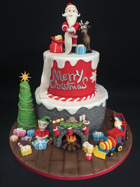 2 tier Christmas cake. Handmade Santa, reindeer and elf with Christmas train and fireplace Christmas Birthday Cake, Thomas Cakes, Cake Competition, Santa Cake, Tiered Cake Design, Cake Show, Christmas Cake Designs, Xmas Cake, Winter Cake