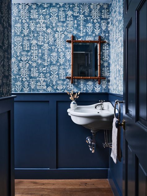 I will always be in love with this Dover farmhouse bathroom. The wallpaper's gently weathered finish adds a vintage charm to the space that complements the navy wainscoting. I deliberately used a pared-back approach to accessories to keep the space clean. Photo: @jaredkuziaphoto #meghanshadrickinteriors #bathroomdesign #modernbathroomdesign #bathroomgoals #bathroomdecoration #bathroominspo #bathroomdecor #modernbath #architecturaldesign #architecturalinspiration #bostoninteriors #interiorde... Navy Wainscoting, Navy Powder Room, Luxury Powder Room, Clean Photo, Glamorous Bathroom, Bold Bathroom, Wainscoting Bathroom, Boston Interiors, Blue Bathroom Decor