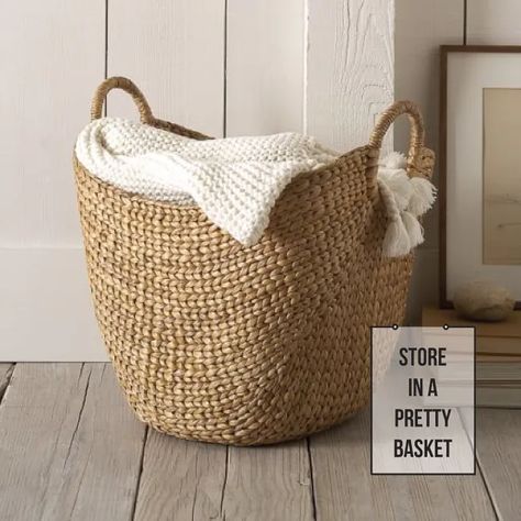 5 Clever Ways to Incorporate Blanket Storage In Your Home - Francois et Moi Basket Decor, Blanket Basket, Seagrass Basket, Nicolas Cage, Water Hyacinth, Wooden Floor, Blanket Storage, Large Baskets, Woven Basket