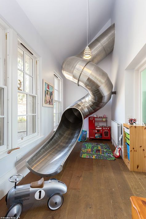 A family home that comes with its very own indoor slide leading to the kitchen is still on... Playroom Slide, Slide Bedroom, Basement Door, Indoor Playroom, Modern Tub, Playground Slide, House Slide, Indoor Slides, Playroom Design