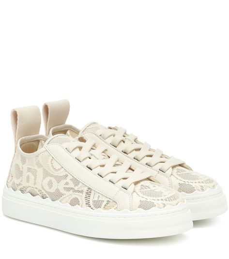 Chloé - Lauren lace sneakers - Chloé updates its Lauren sneakers in intricate, logo-adorned lace for an ultra-feminine finish. With scalloped trim running around the elevated soles and a high-contrast logo print at the pull tabs, this "Mild Beige" pair taps into the brand's bohemian styling, while maintaining a coveted sports-luxe look. seen @ www.mytheresa.com Adidas Originals Falcon, Chloe Logo, Nike M2k, Prada Sneakers, Versace Sneakers, Gucci Sneakers, Chloe Shoes, Lace Sneakers, Sports Luxe