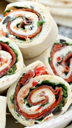 Italian Sub Sandwich Tortilla Pinwheels ~ These tasty tortilla roll-ups start with a cream cheese spread that’s loaded with garlic, onions, olives, cheese, peppers and Italian seasoning.. Amazing! Italian Sub Sandwich, Fingerfood Recipes, Tortilla Pinwheels, Mississippi Pot, Sub Sandwich, Cream Cheese Spread, Tortilla Rolls, Italian Sub, Italian Meats