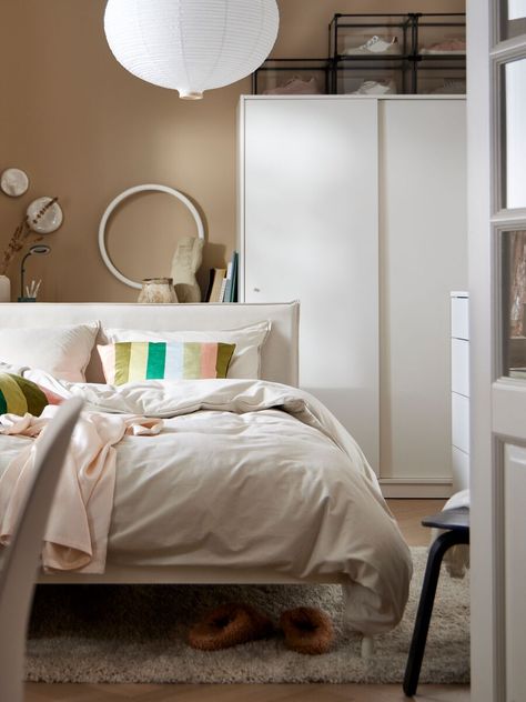 A sleek wardrobe that’s coordinated with the bed and the bed linen sets the look here. Its sliding doors don’t stick out when they’re open – perfect in a small bedroom like this. The transparent boxes on top mean your shoes can make style statements even when you’re not wearing them.

#ikea #bedroominspo #schlafzimmerideen #KLEPPSTAD #wardrobe #bedroomideas #bedroomstorage #organisation #interiorideas #bedroominterior #furnishing #interior #design #skandi #scandinavian #myikea Ikea Kleppstad Bed, Kleppstad Ikea Ideas, Ikea Kleppstad, Modern Small Bedroom Ideas, Modern Small Bedroom, Sleek Wardrobe, Cama Ikea, Modern Minimalist Bedroom, Small Bedroom Ideas