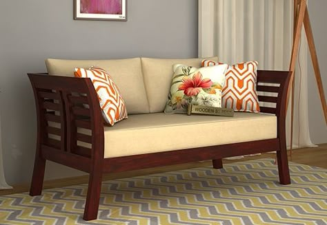 Simple and elegant this is how Darwin 2 Seater Wooden Sofa with beautiful Mahogany Finish can be introduced. Buy two seater sofa online for amazing living room set-up from the gorgeous 2 seater sofa designs at Wooden Street from #Noida #Chennai #Thane Family Area, Sofa Design Wood, Latest Sofa Designs, Wooden Sofa Set Designs, Wooden Sofa Designs, Wooden Street, Living Room Sofa Set, Wooden Sofa Set, Furniture Design Wooden