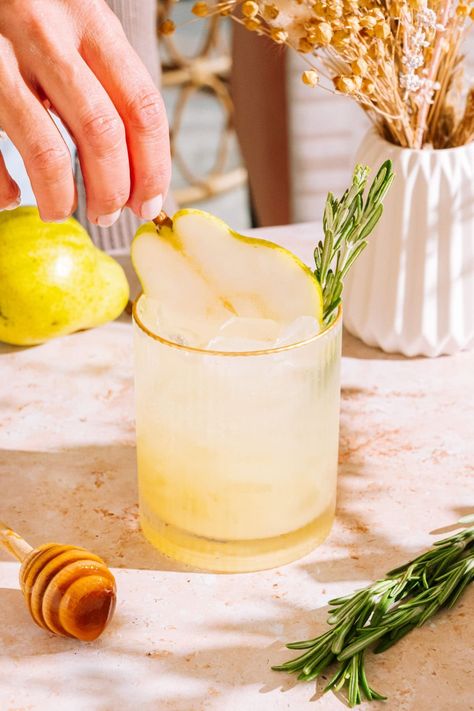 Easy Rosemary Pear Mocktail - The Social Sipper Pear Mocktail, Wine Spritzer Recipe, Passion Fruit Mojito, Easy Mocktails, White Wine Spritzer, Easy Mocktail Recipes, Spritzer Recipes, Mojito Mocktail, Wine Spritzer