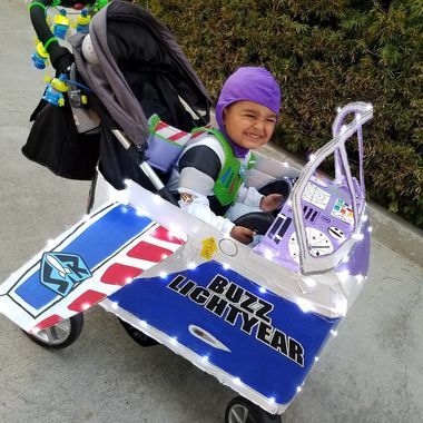 Buzz Lightyear Spaceship Stroller, Stroller Costume Ideas, Buzz Lightyear Costume Toddler, Baby Stroller Costume, Baby Food Chart By Age, Stroller Halloween Costumes, Batman And Robin Costumes, Stroller Costume, Meat Baby Food