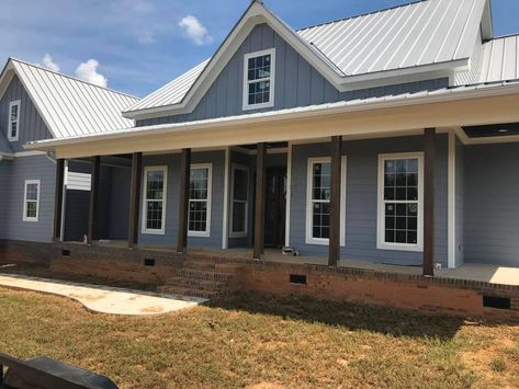 Silver metal roof; trim is SW Alabaster & siding is SW let it rain. All stain is Dark walnut Sherwin Williams Let It Rain, Metal Roof Houses Color Combos, Blue Farmhouse Exterior, Rooftop Hangout, Tin Roof House, Farmhouse Exterior Colors, Black Metal Roof, Metal Roof Houses, Metal Roof Colors