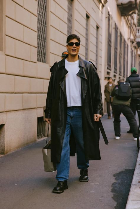 How to Wear Leather Like a Front-Row Fashion Freak | GQ Leather Coat Men, Black Leather Coat Outfit Men, The Row Street Style, Leather Outfit Men, Black Leather Trench Coat Outfit, Leather Trench Coat Outfit, Leather Duster Coat Men, Men’s Long Black Coat Outfit, Trench Coat Street Style