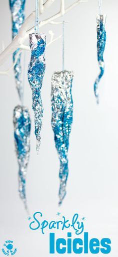 WINTER ICICLE CRAFT - This Sparkly Icicle Craft is a fun Winter craft for kids. Used as Christmas ornaments or for snowy displays they brings the beauty & magic of Winter inside. #Winter #WinterCrafts #WinterCraftIdeas #Icicles #IcicleCraft #WinterArt #WinterActivity #WinterActivitiesForKids #KidsCrafts #CraftsForKids  #WinterCraftIdeas Icicle Crafts, Høstaktiviteter For Barn, Winter Crafts For Toddlers, Juleverksted For Barn, Fun Winter Crafts, January Crafts, Winter Art Projects, Winter Activities For Kids, Winter Craft