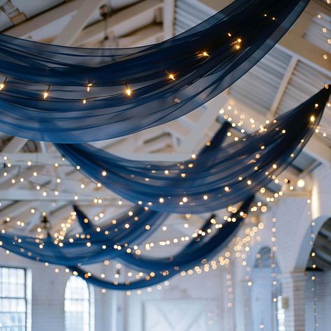 Transform Your Event With Our 5ftx32ft Navy Blue Chiffon Ceiling Drapery. Elegant, Versatile, And Easy To Install. ✓ Get Yours Today! Elegant Blue Party Decorations, Dark Blue Balloon Decorations, Starry Night Wedding Backdrop, Ceiling Drapery Hanging, Starry Night Wedding Decorations, Gala Ceiling Decor, Starry Night Prom Table Decor, Into The Stars Prom Theme, Under The Stars Party Ideas