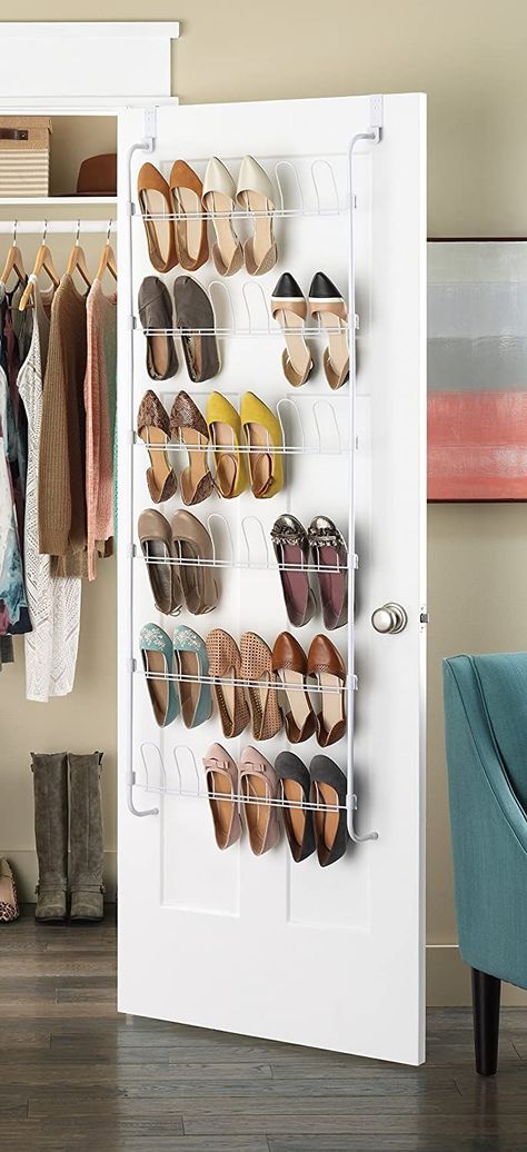 15 Shoe Storage Secrets Only the Pros Know | While the pros generally consider hanging shoes on the back of a closet as a last resort, in smaller closets, a door-mount shoe rack can be a real space-saver. If you’re looking to buy one, the pros agree that a metal rack makes for a sturdier solution. #declutter #organizationtips #realsimple #declutterideas #howtoclean #homeorganization Organisation, Over Door Shoe Rack, Wooden Shoe Rack Designs, Door Shoe Rack, Hanging Shoe Rack, Diy Shoe Rack, Wooden Shoe Racks, Hanging Shoe Organizer, Shoes Storage