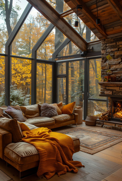 Wrapped in the warmth of a stone hearth, under a canopy of glass, autumn's embrace fills this cozy cabin, where forest views whisper tales of serenity. Cozy Forest Cabin, Cozy Forest Living Room, Forest Cottage Interior, Cozy Forest House, Forest House Interior, Cabin Great Room, Cozy Cabin Interior, Peaceful House, Pretty Visuals