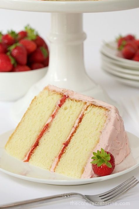 Strawberry Layer Cake - with layers of tender, moist yellow cake sandwiched between a double dose of strawberries - fresh strawberry buttercream and strawberry jam, this cake is the kind of confection that dreams are made of! Yellow Cake With Strawberry Filling, Yellow Cake With Strawberries, 70th Cake, Strawberry Layer Cake, Strawberry Layer Cakes, Double Layer Cake, Moist Yellow Cakes, Dessert Treats, Buckwheat Cake