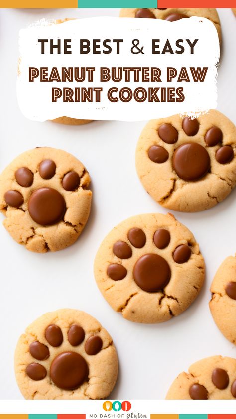 Dog Paw Peanut Butter Cookies, Bear Paw Peanut Butter Cookies, Paw Cookies Recipe, Peanut Butter Bear Paw Cookies, Bear Print Cookies, Puppy Themed Desserts, Peanut Butter Paw Cookies, Bear Paw Peanut Butter Blossom Cookies, Paw Print Peanut Butter Blossoms