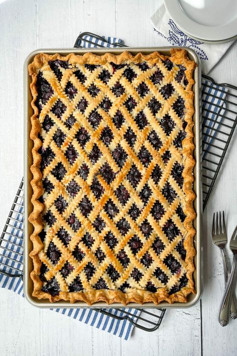 This Blueberry Slab Pie recipe is an easy way to make your favorite pie for a season of berries, festivities, and gatherings. Oh-so-delicious, its berry filling is packed with sweet bright flavors and warm spices. Blueberry Slab Pie Recipe, Blueberry Slab Pie, Lattice Pastry, Slab Pies, Berry Filling, Baking Pan Sizes, Slab Pie Recipes, Pie Crust Edges, Easy Sweets